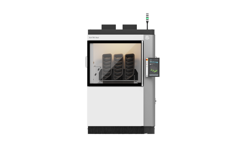 Der Hochgeschwindigkeits-Synchron-3D-Drucker SLA 750 Dual mit Doppellaser von 3D Systems gehört zur umfassenden Workflow-Lösung des Unternehmens für den industriellen Fertigungsbereich. Innen: Harzteile aus produktionsfähigem Accura AMX Rigid Black. 